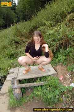 Pissing teen on the old table - N