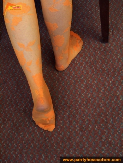 Orange pantyhose fetish teen girl posing on the floor - N