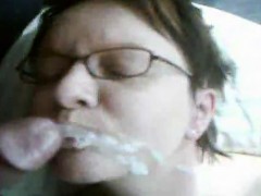 Woman wearing eyeglasses desires cum in her mouth