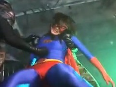 Super heroine is caught and gets tied up and her boobs sque