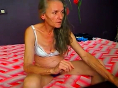 Skinny hairy granny playing on cam