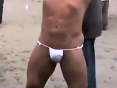 muscled-asian-stud-bares-almost-all-at-the-beach